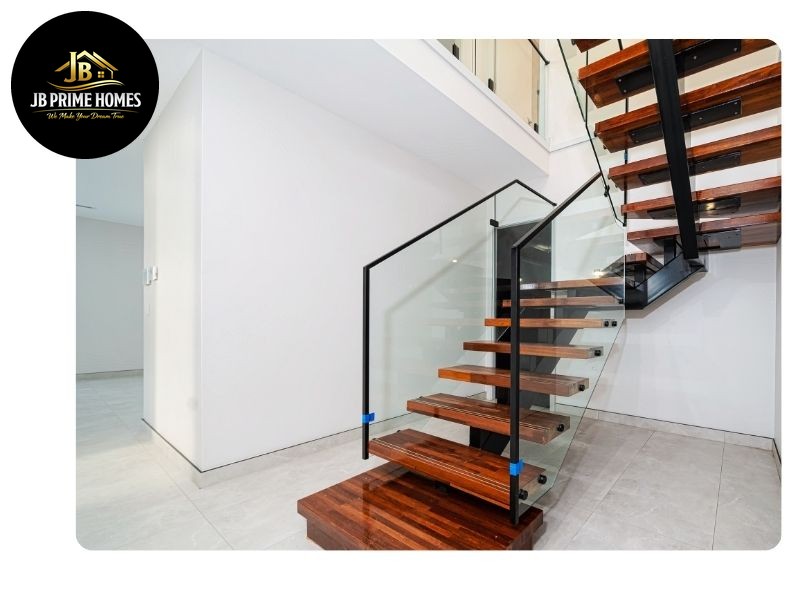 Floating timber staircase with a glass balustrade